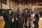 Photo of graduates in cap and gown