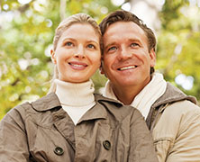 Photo of a man and woman smiling for a picture. Link to Life Stage Gift Planner Under Age 45 Gifts.