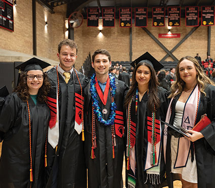 Photo of graduates in cap and gown
